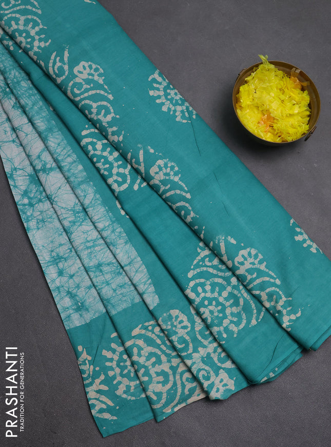 Batik cotton saree teal green with allover prints and batik printed border