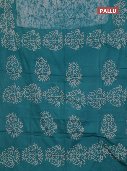 Batik cotton saree teal green with allover prints and batik printed border