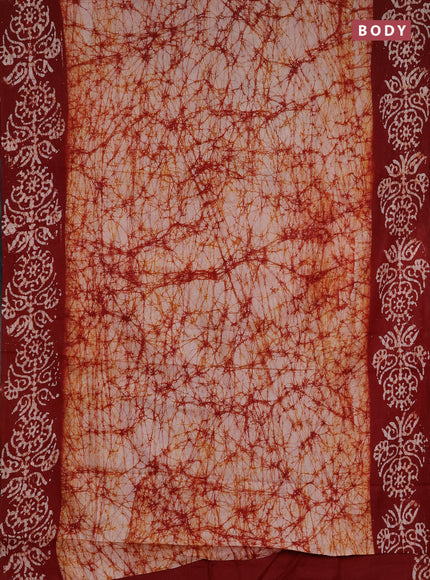 Batik cotton saree beige and deep maroon with allover prints and batik printed border