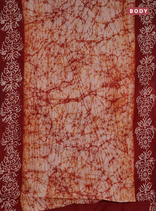 Batik cotton saree beige and deep maroon with allover prints and batik printed border