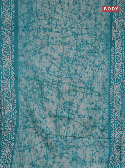 Batik cotton saree teal green with allover prints and batik printed border