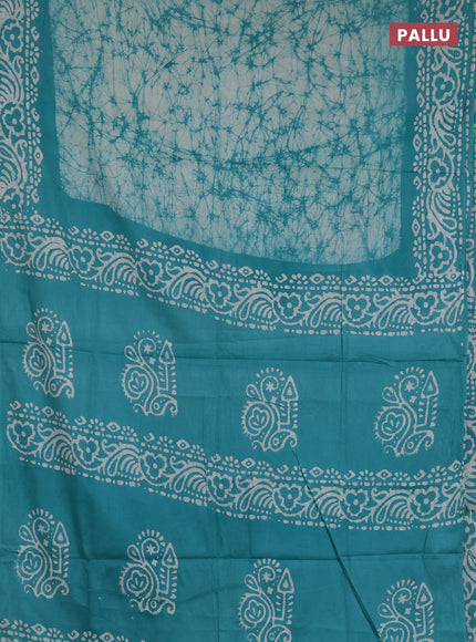 Batik cotton saree teal green with allover prints and batik printed border