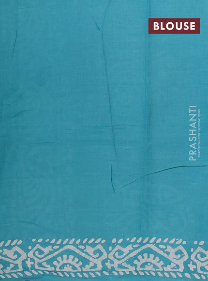 Batik cotton saree teal green with allover prints and batik printed border