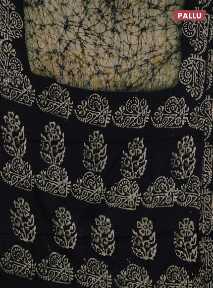 Batik cotton saree beige and black with allover prints and batik printed border