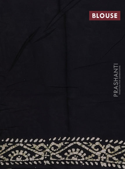 Batik cotton saree beige and black with allover prints and batik printed border