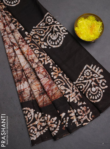Batik cotton saree beige and coffee brown with allover prints and batik printed border