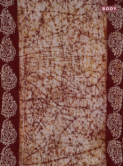 Batik cotton saree off white and maroon with allover prints and batik printed border