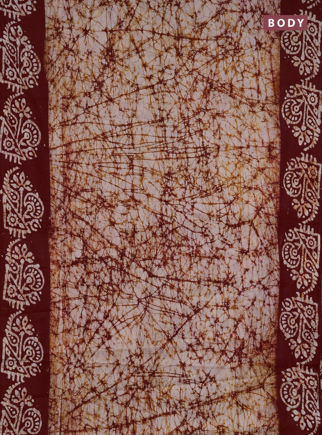 Batik cotton saree off white and maroon with allover prints and batik printed border