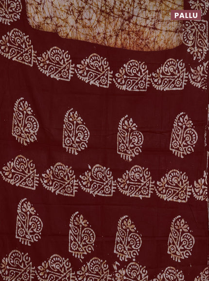 Batik cotton saree off white and maroon with allover prints and batik printed border
