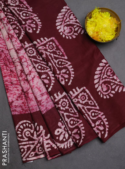 Batik cotton saree deep wine shade with allover prints and batik printed border