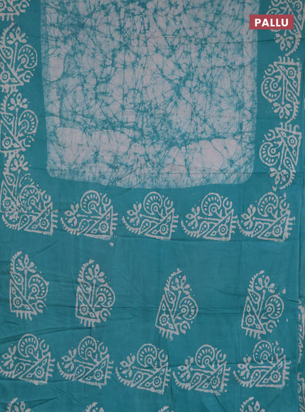 Batik cotton saree teal green with allover prints and batik printed border