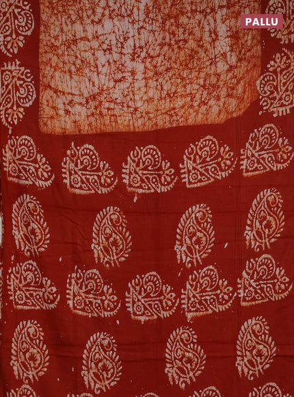 Batik cotton saree rust shade with allover prints and batik printed border