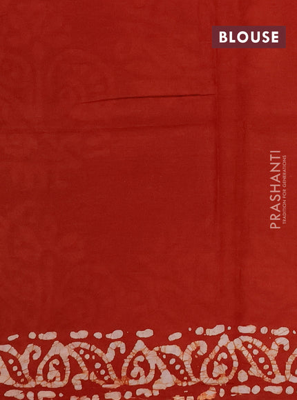 Batik cotton saree rust shade with allover prints and batik printed border