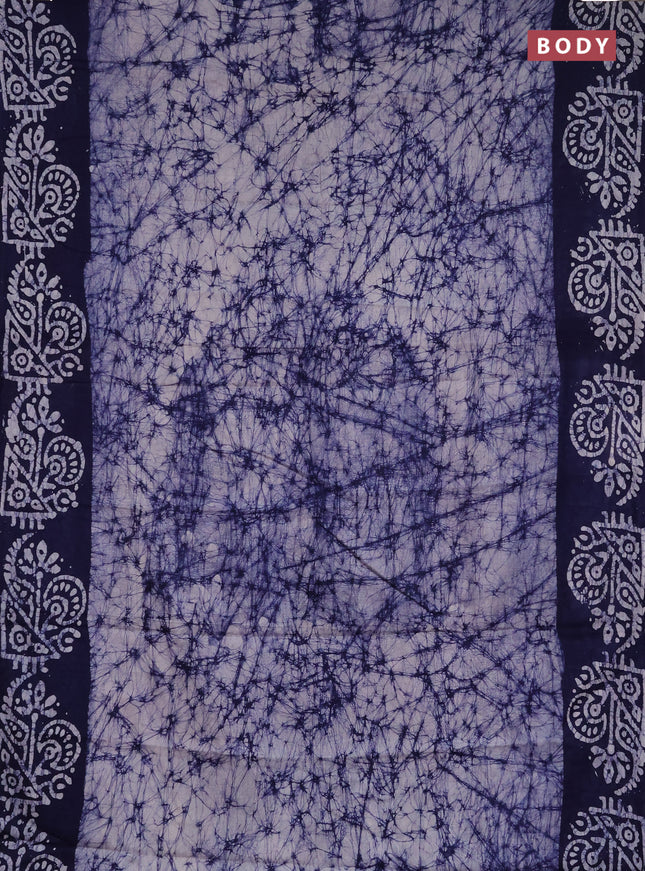 Batik cotton saree navy blue with allover prints and batik printed border