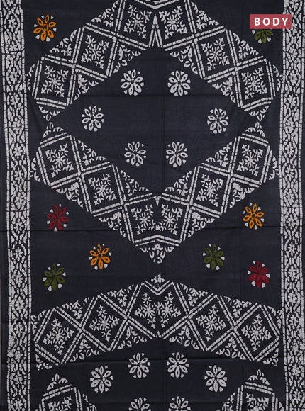Batik cotton saree black with allover prints and batik printed border
