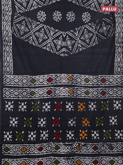 Batik cotton saree black with allover prints and batik printed border