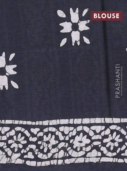 Batik cotton saree black with allover prints and batik printed border