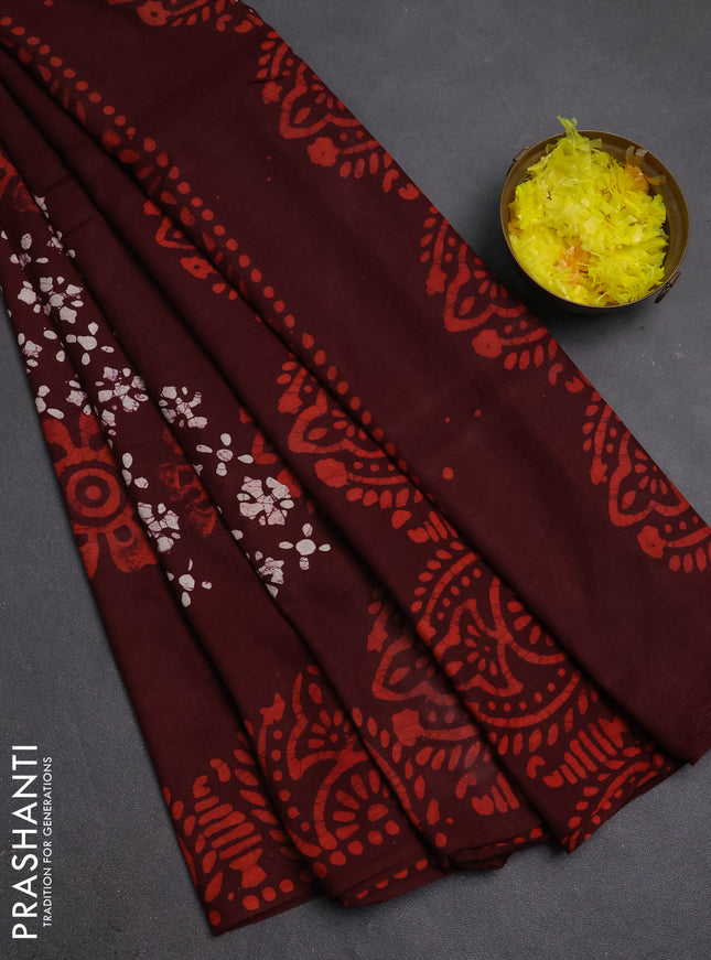 Batik cotton saree deep maroon with allover prints and batik printed border