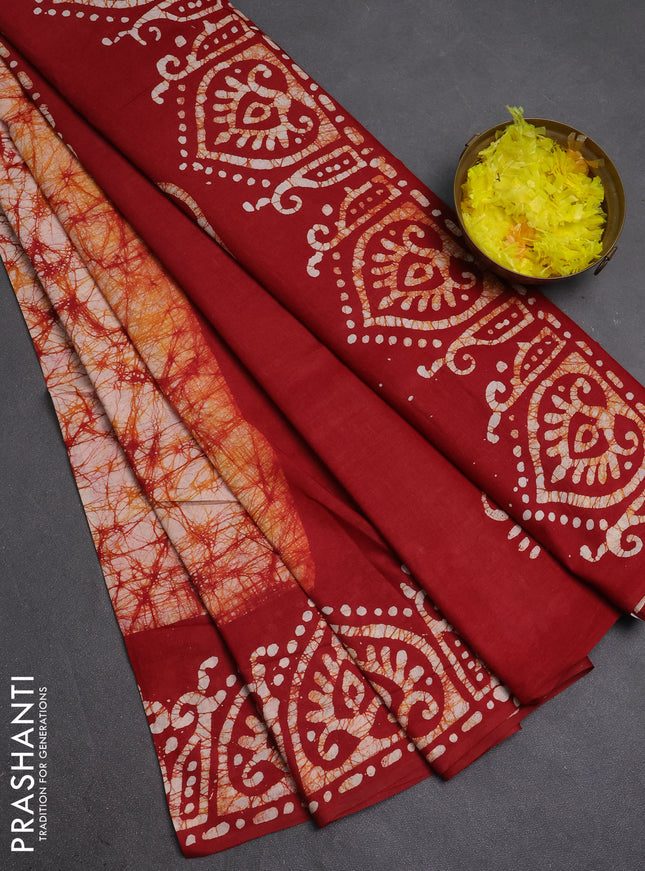 Batik cotton saree maroon with allover prints and batik printed border