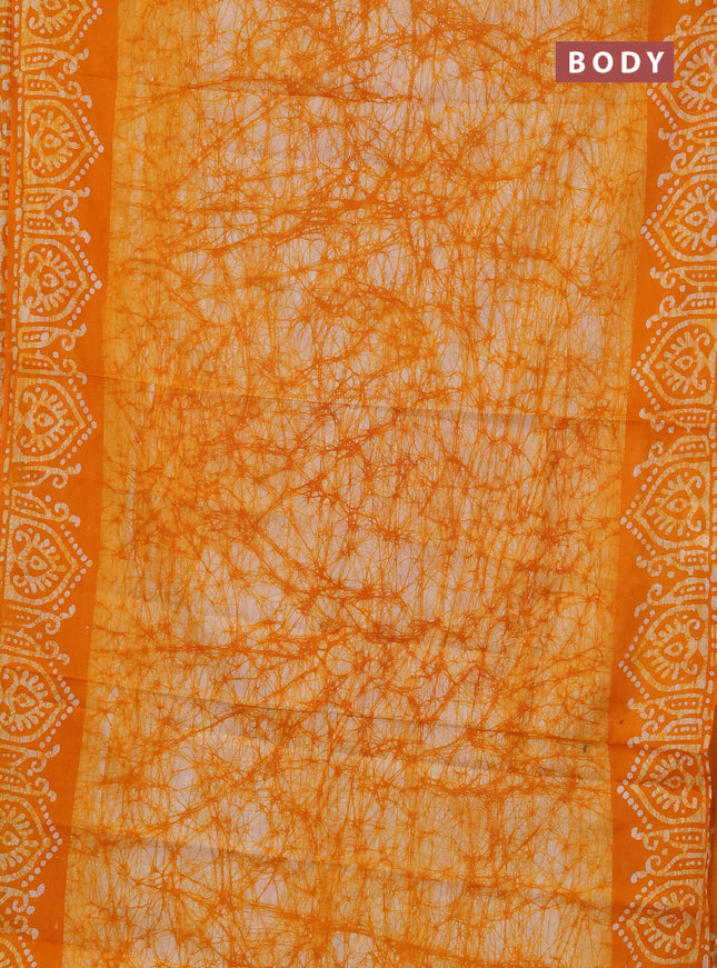 Batik cotton saree mango yellow with allover prints and batik printed border