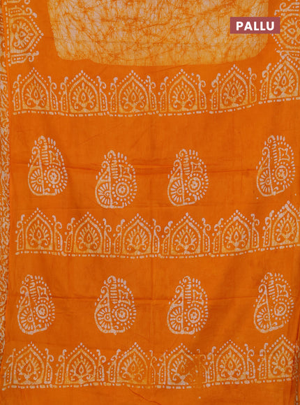 Batik cotton saree mango yellow with allover prints and batik printed border