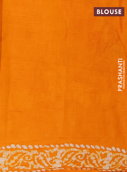 Batik cotton saree mango yellow with allover prints and batik printed border