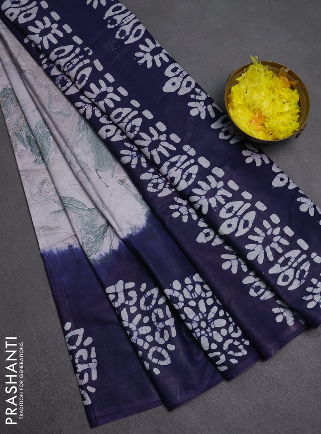 Batik cotton saree multi colour and navy blue with allover prints and batik printed border