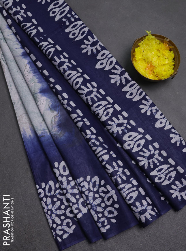 Batik cotton saree multi colour and navy blue with allover prints and batik printed border