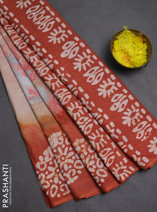 Batik cotton saree multi colour and rust shade with allover prints and batik printed border