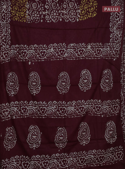 Batik cotton saree deep wine shade with allover prints and batik printed border