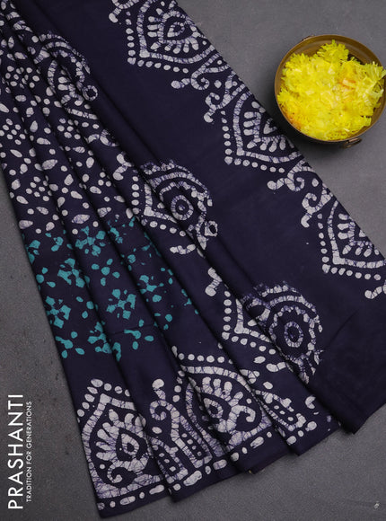 Batik cotton saree teal green and navy blue with allover prints and batik printed border
