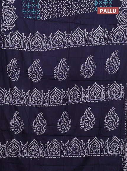 Batik cotton saree teal green and navy blue with allover prints and batik printed border