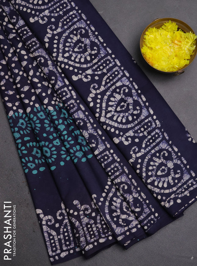 Batik cotton saree navy blue with allover prints and batik printed border