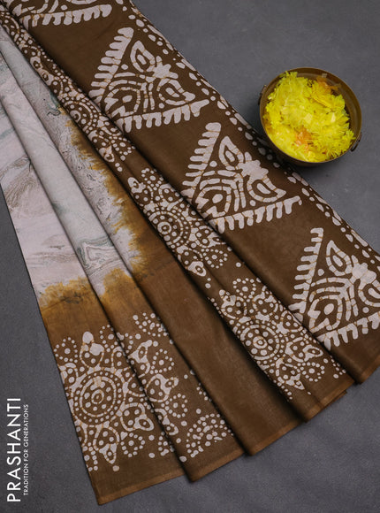 Batik cotton saree multi colour and mehendi green with allover prints and batik printed border
