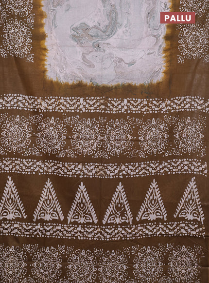 Batik cotton saree multi colour and mehendi green with allover prints and batik printed border