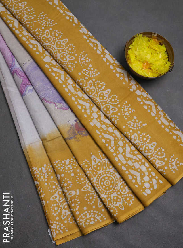 Batik cotton saree multi colour and mustard yellow with allover prints and batik printed border