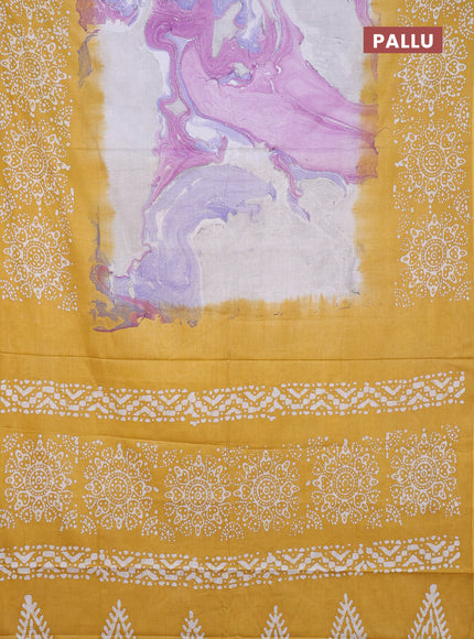 Batik cotton saree multi colour and mustard yellow with allover prints and batik printed border