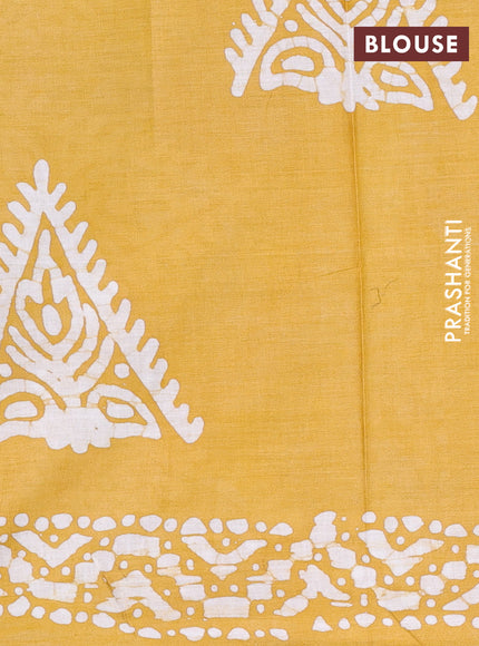 Batik cotton saree multi colour and mustard yellow with allover prints and batik printed border