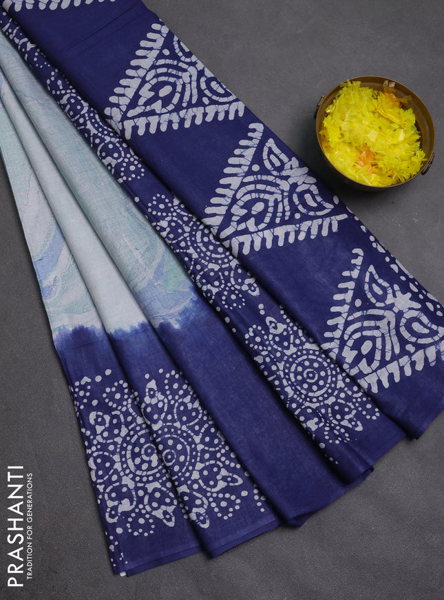 Batik cotton saree multi colour and navy blue with allover prints and batik printed border
