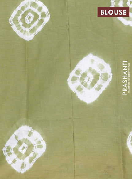 Batik cotton saree multi colour and mehendi green with allover prints and batik printed border
