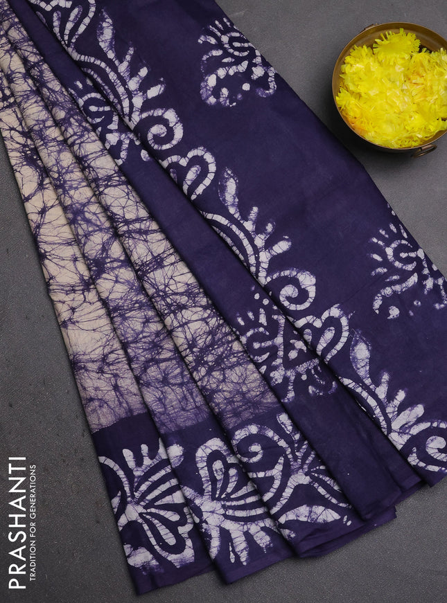 Batik cotton saree beige and navy blue with allover prints and batik printed border