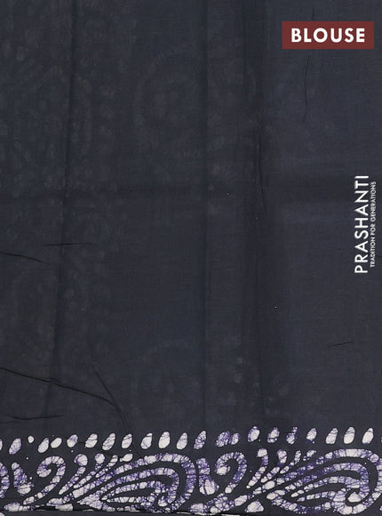 Batik cotton saree green with allover prints and batik printed border