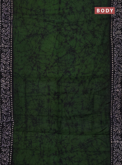 Batik cotton saree mehendi green and black with allover prints and batik printed border