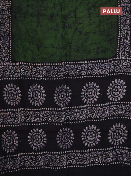Batik cotton saree mehendi green and black with allover prints and batik printed border