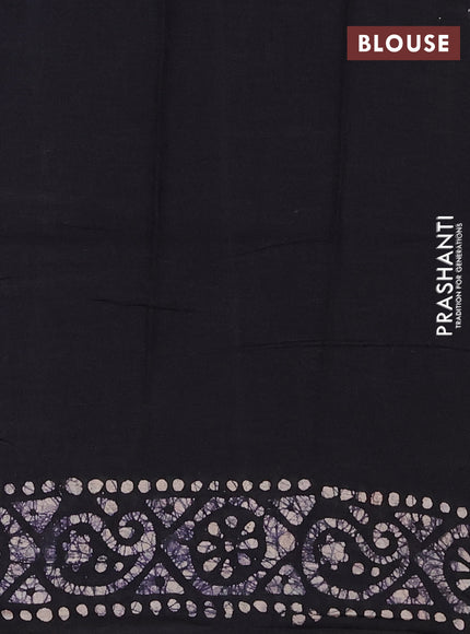Batik cotton saree mehendi green and black with allover prints and batik printed border