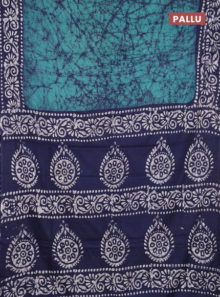 Batik cotton saree green shade and navy blue with allover prints and batik printed border