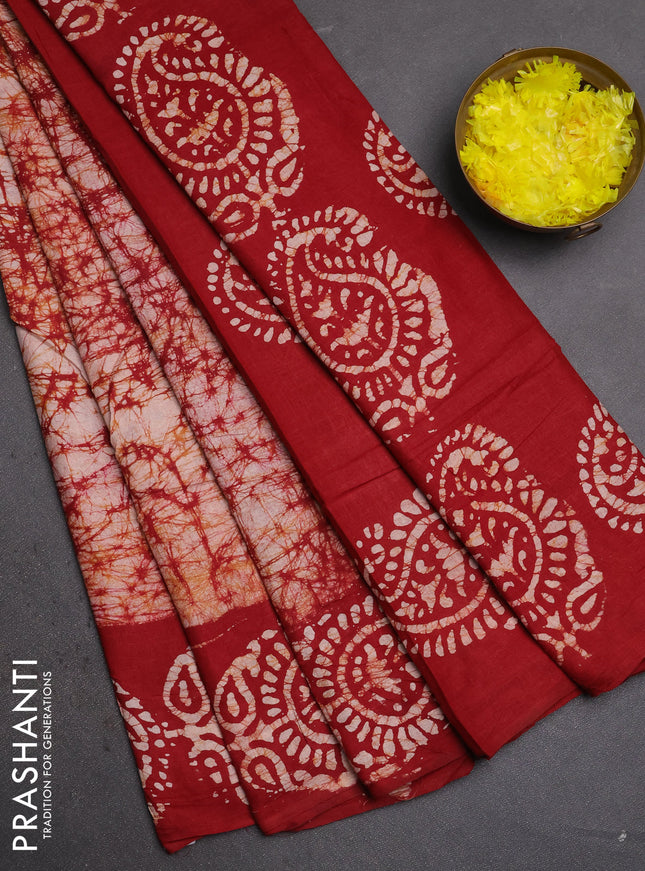 Batik cotton saree red with allover prints and batik printed border