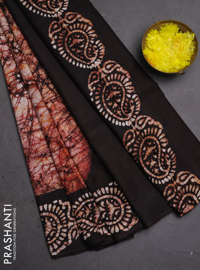 Batik cotton saree off white and black with allover prints and batik printed border