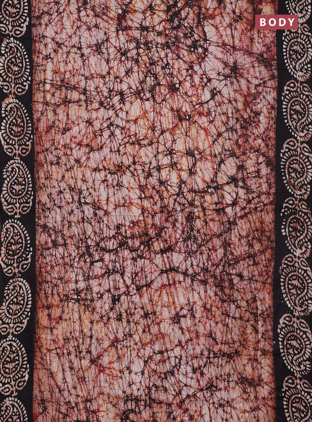 Batik cotton saree off white and black with allover prints and batik printed border