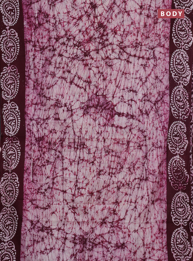 Batik cotton saree off white and wine shade with allover prints and batik printed border